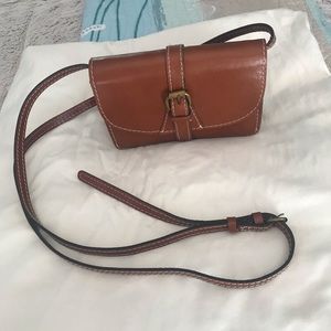 Cross over leather bag.  Used 1x no stains or scratches.  Width 7 inches